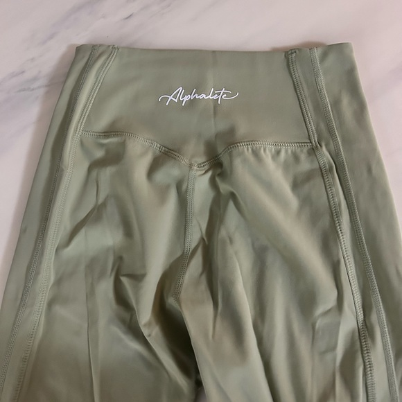 Almost brand new alphalete leggings. Size Md. Medium compression. Sage green. - Picture 5 of 5